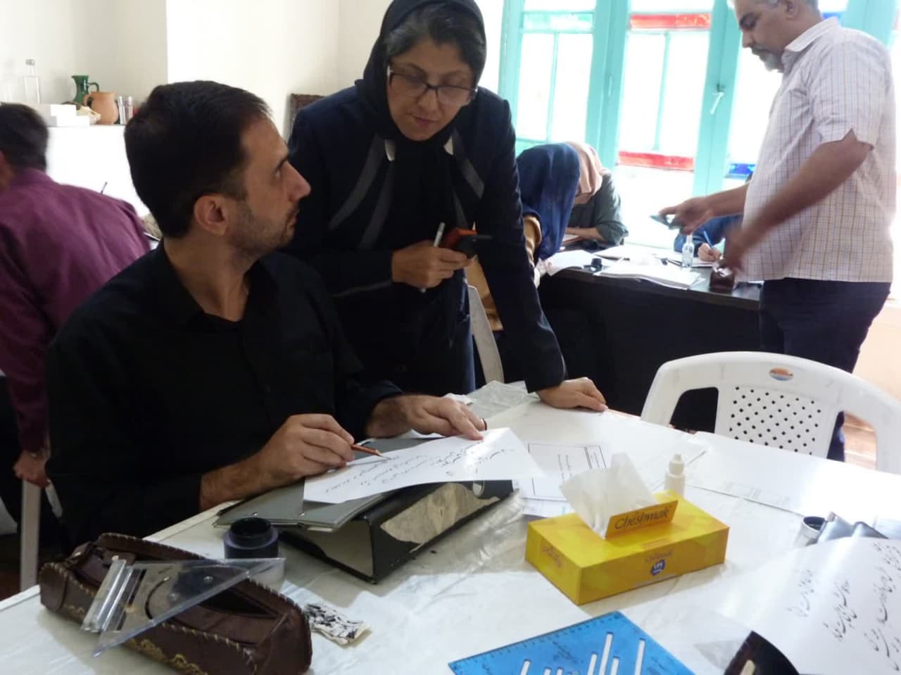 تصاویری از برگزاری آزمون خوشنویسی در کرج